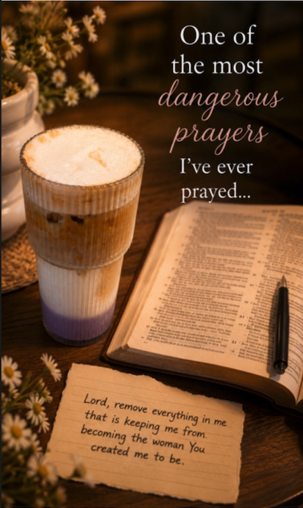 An open Bible, a handwritten prayer note, a drink and flowers on a wooden table